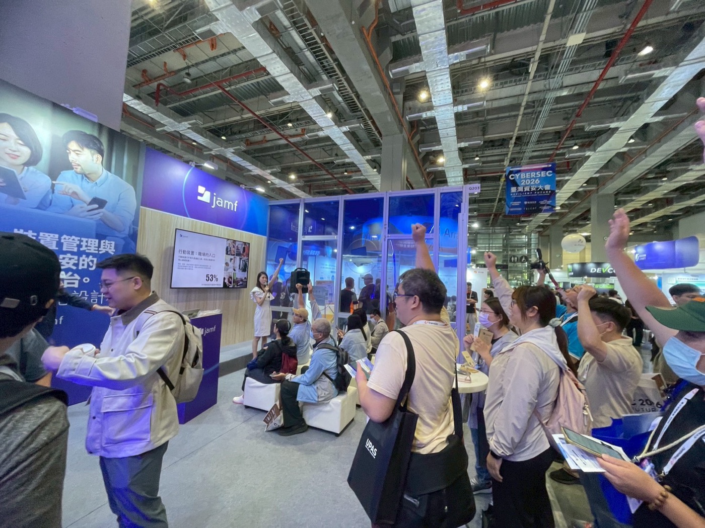 A full crowd at a KlickKlack booth talk during CYBERSEC 2026